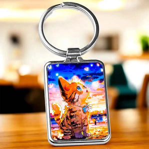 Porte-clés carré en métal avec image de chat animé.