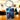 Porte-clés rectangulaire en métal argenté avec une illustration d'un personnage en armure aux cheveux bleus.
