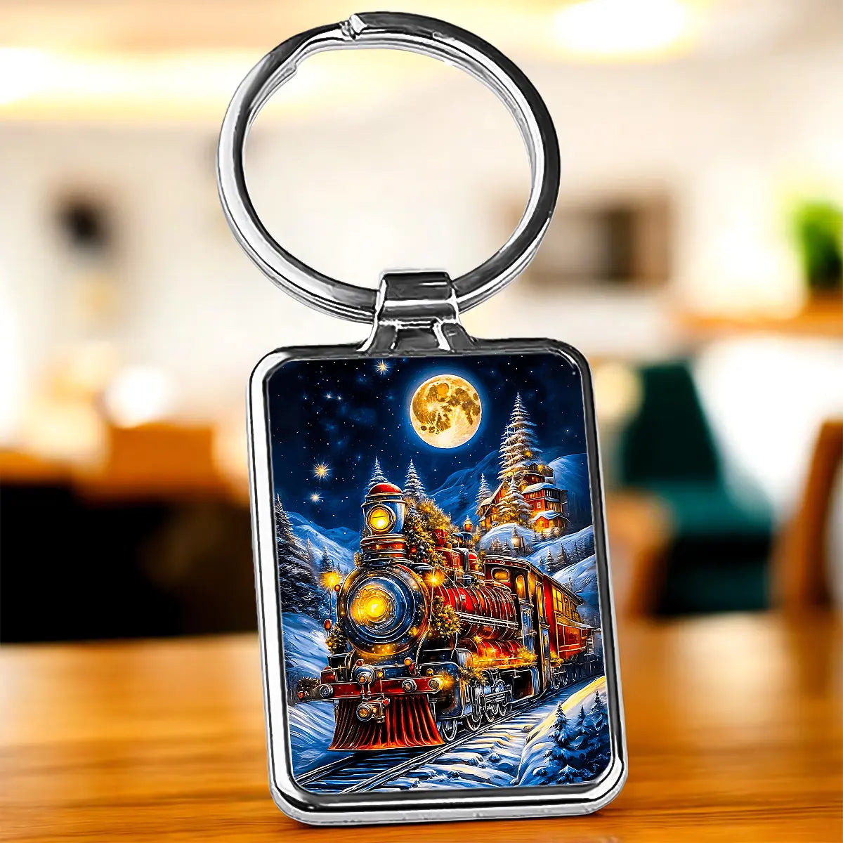 Porte-clé Train de Noël Les Bois d’Aurore : accessoire illustré en métal, esprit fêtes d’hiver